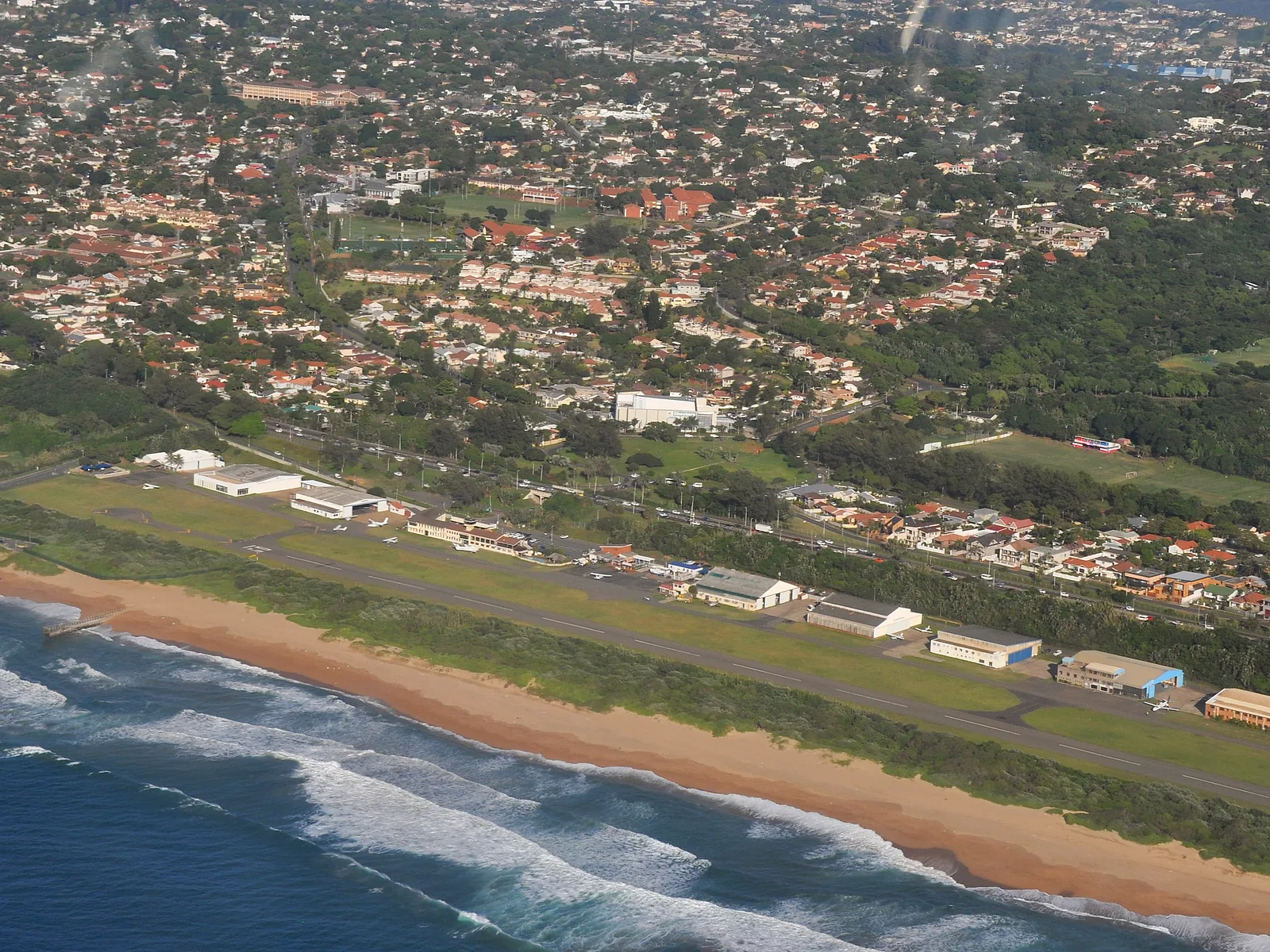 Aerial view over North Durban coastline and suburbs near Red Hill