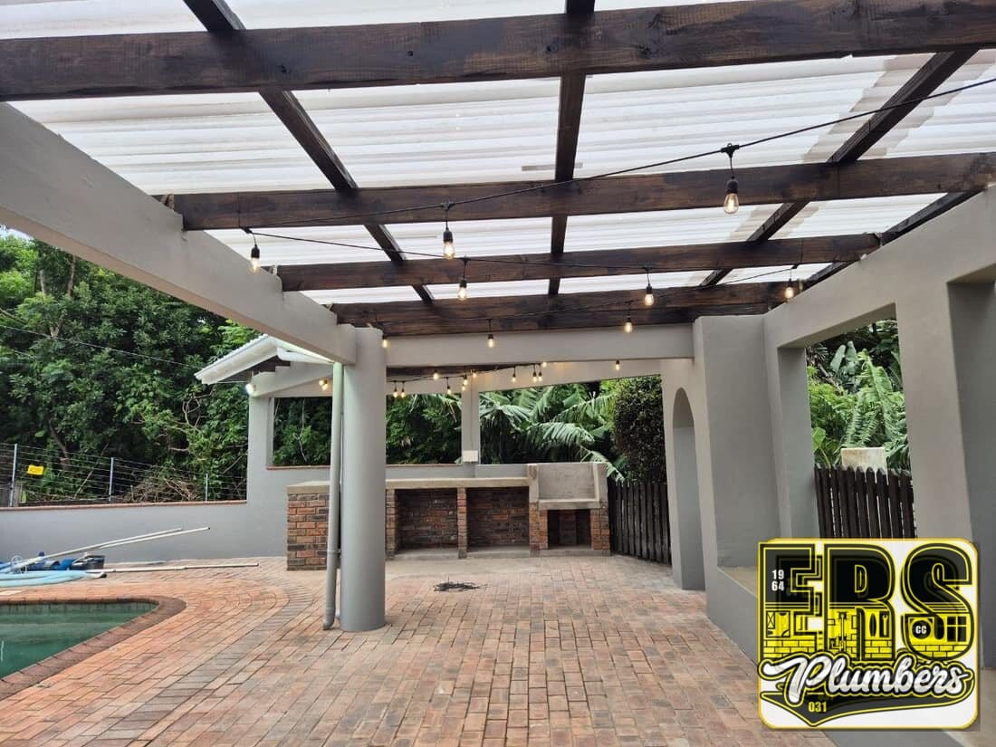 Completed covered braai and pool entertainment area by ERS