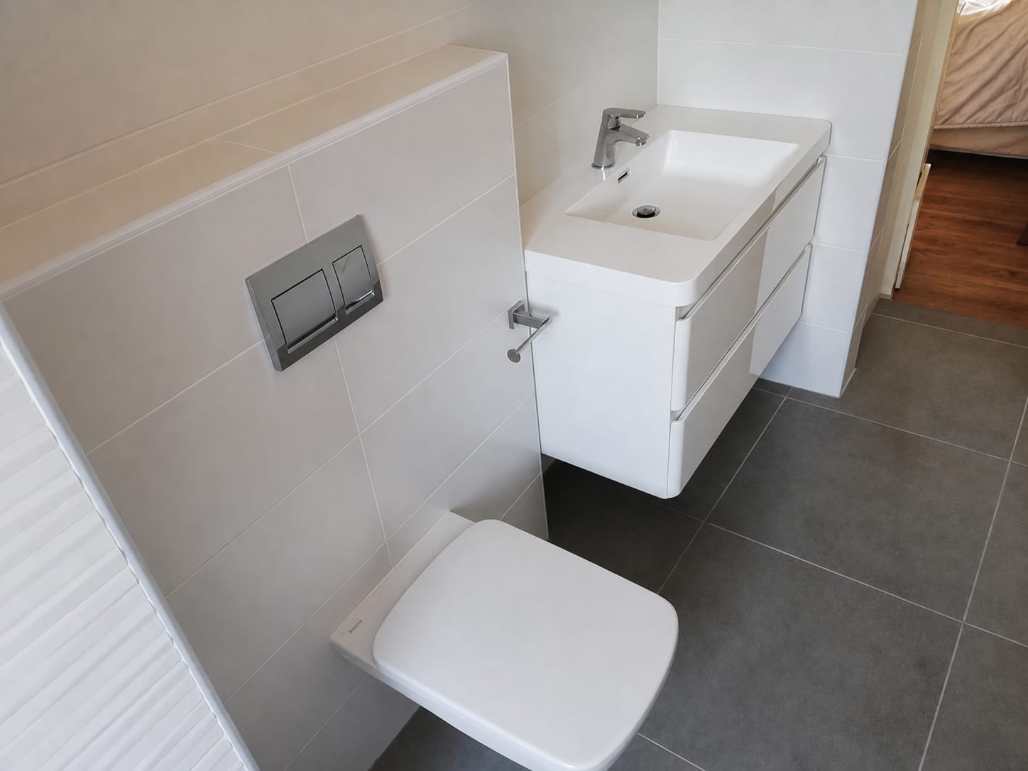 AI-restored photograph of a completed ERS compact bathroom renovation in Durban North